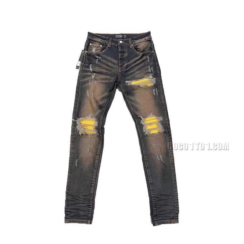 Amiri Logo Ripped Jeans