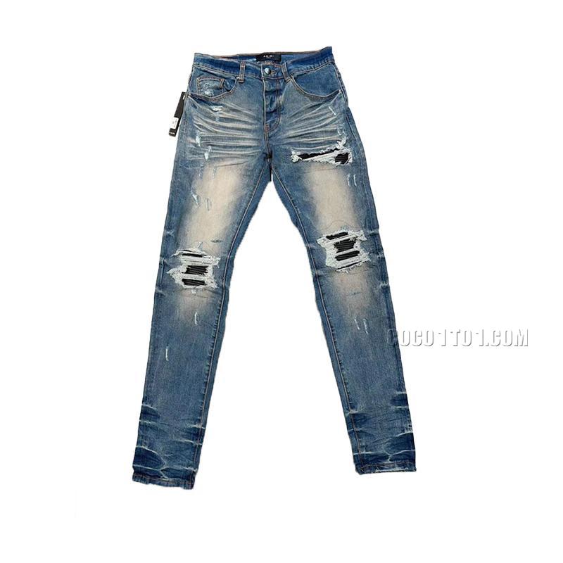Amiri Logo Ripped Jeans